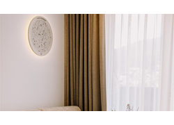 Ovale LED Wandleuchten aus Holz Gräser und Blüten im Klosterbräu Hotel Seefeld